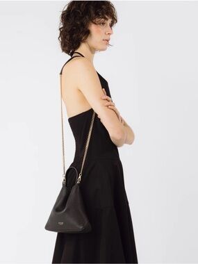 Stow London Mini Curve Crossbody Bag in Leather with Gold Chain Strap